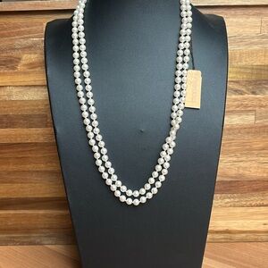 Vintage MARVELLA 45 inch “swinger” single strand faux pearl necklace